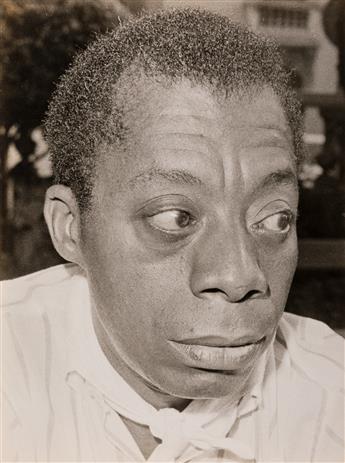 JOHN PAIGNTON (JOHN S. BARRINGTON, 1920-1991) A group of 5 photographs of James Baldwin, author and advocate for the Civil Rights Movem